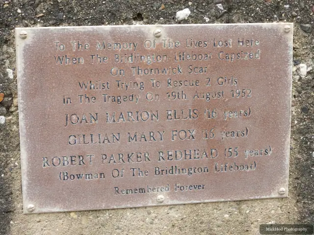A memorial plaque beside the coastal path at Bempton Cliffs.